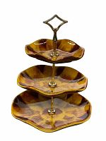 Front view of the 3-tier dessert server showing the scalloped edges and harvest gold mottled glaze.