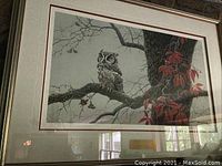 Full view of framed owl print showing image, double mat, silver-tone frame