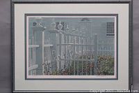 Overall view of framed print showing silver metal frame and double matting