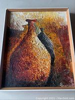 Frontal view of the framed textured painting showing three vases in earth tones with prominent brush texture.