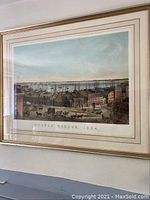Full view of Boston Harbor 1854 framed print in cream and gold frame with visible matting.