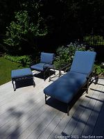 Full set on deck: chaise lounge, armchair, ottoman, side table