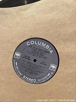 Close-up photo of vinyl record with Columbia label titled "Joy of Man's Desiring."