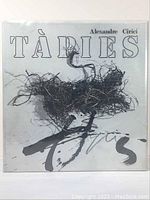 Front cover of the Tapies monograph showing abstract art and title with artist's name Alexandre Cirici