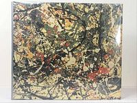 Front cover of the Jackson Pollock art book showing abstract drip painting dust jacket artwork.