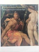 Front cover of the art book showing classical painting with two mythological or historical figures, male with staff and female nude.