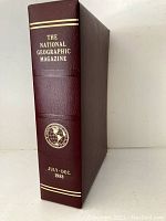 Spine of the maroon binder labeled 'The National Geographic Magazine July-Dec 1988' with gold embossed text and emblem.