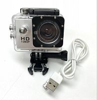 Front view of the 1080p HD sports camera in clear waterproof housing accompanied by USB cable.