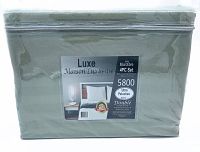 Packaged green Luxe Maison Luxueuse 4 piece double bed sheet set with product branding and zipper.
