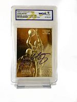 Front view of the gold embossed Kobe Bryant rookie card with purple facsimile signature, encased and graded by WCG as 10 GEM MT.