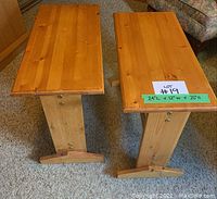 Top view of both oak end tables showing rectangular tops and T-shaped bases