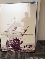 Full view of the framed poster showing sailing ship on water, titled Shogun.
