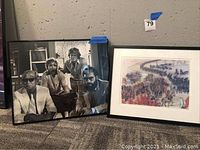 Both framed artworks side by side against wall