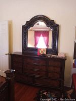 Full view of dresser with mirror, showing overall size and style