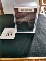 Protective case with label 2005 - Batman Begins