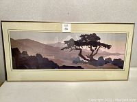 Full view of the framed print showing the entire artwork and frame.