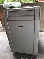 Front view of white Uberhaus portable air conditioning unit showing body and vents