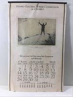 Photo of January 1934 calendar page from Hydro-Electric Power Commission of Ontario with black and white print and calendar dates.