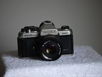 Front view of Yashica FX-3 Super 2000 with 50mm f/2 lens attached