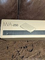 Box top showing ‘IWA-250’ text and illustration of amplifier unit.