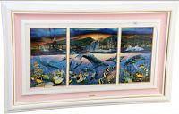 Full view of framed three-panel lithograph in white frame with pink mat