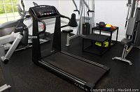 Full view of treadmill in home gym