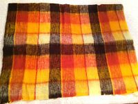 Close-up of Sears soft acrylic-nylon throw blanket in warm multicolor plaid pattern