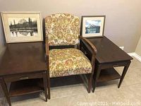 Photo showing two vintage midcentury walnut side tables, floral upholstered chair, and two framed mountain photographs on side tables.