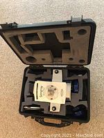 Diving underwater camera in protective case labeled Stingray