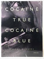 Front cover photo of the book showing title, author, and cover art. Still shrink-wrapped in plastic.