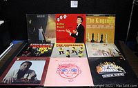 Nine vinyl LPs including Rush, Bobby Rydell, The Kingsmen, The Ventures, Herb Alpert & the Tijuana Brass, Barbra Streisand and a music awards compilation