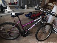 Full view of the Magna Grand Ledge mountain bike showing the frame, tires, saddle, and handlebar.