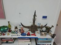 Overall view of all lot items arranged on a shelf