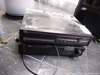 Top front view of Yamaha AM/FM tuner T-80 stacked on Yamaha control amplifier C-60 showing front panels and control knobs/buttons.