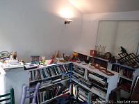 Corner shelf with assorted items and books