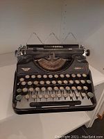 Front view of vintage Continental typewriter showing keyboard and brand name.