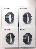 Four sealed boxes of L8Star fitness tracker smart watches shown side by side.