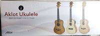 Box packaging showing three different Aklot ukulele designs and brand name.