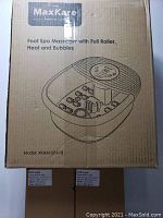Retail box of MaxKare Foot Spa Massager with full roller, heat and bubbles, model XKAM-SPA18 with two boxes labeled LED Light Therapy beneath.