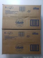 Two sealed cardboard boxes of Cottonelle FreshFeel Flushable Wipes stacked, with product labeling visible showing 8 pouches and 42 cloth wipes per pouch, barcodes.