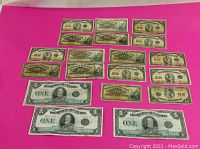 Front view of all notes laid out together