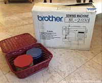 Original Brother XL-2030 sewing machine box and red basket with accessories