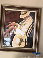 Full view of the framed jazz painting showing the musician in white suit and hat playing piano.