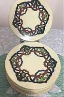 Stack of 6 antique porcelain plates with an Art Nouveau circular floral design in green, blue, and brown shades. Plates are cream-colored with gold trim showing wear.