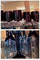 Close-up photo showing over 30 dark red low-stemmed glasses set together on a glass shelf.