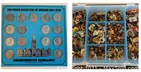 Assorted pins stored in clear sectioned plastic boxes
