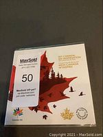 Photo of the sealed original package of the 2017 Canada 150 My Canada My Inspiration coin set featuring a red maple leaf and text.