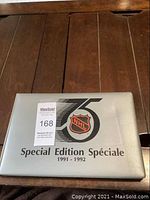 Silver collector binder with NHL 75th anniversary logo labeled Special Edition 1991-1992.