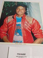 Full view of 8×10 color photo mounted on white background with MaxSold card visible