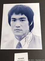 Overall front view of 8x10 black and white Bruce Lee photograph showing full image and signature